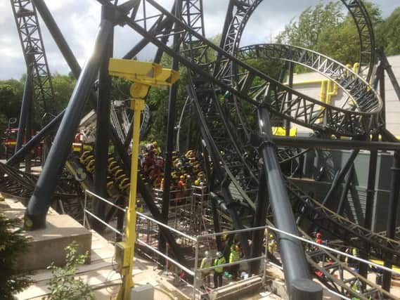 The scene at Alton Towers as four teenagers have suffered serious leg injuries in a collision between two carriages on the amusement park's Smiler rollercoaster. Picture: PA/Twitter