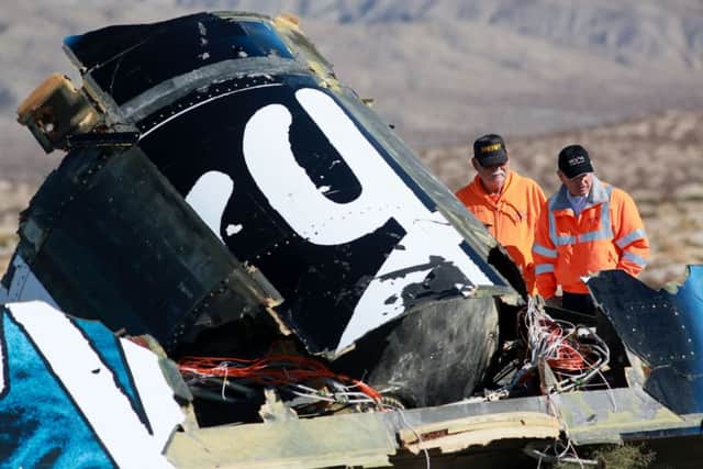 Sheriff's deputies inspect the wreckage. Picture: Getty