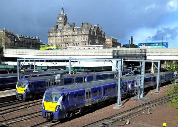 ScotRail trains at Edinburghs Waverley station. The franchise is now operated by Dutch state company Abellio. Picture: Jane Barlow