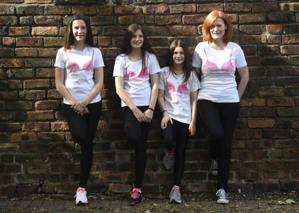 Carrie Johnson with daughters Megan, Ellie and Hannah are among those taking part in next weekends charity MoonWalk. Picture: Greg Macvean