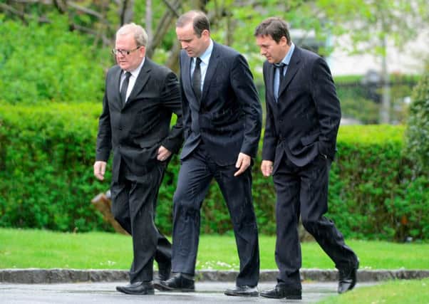 Still Game stars Ford Kiernan and Greg Hemphill, left and centre, at the funeral of Still Game actor John Sinclair, stage name Jake D'Arcy. Picture: Hemedia