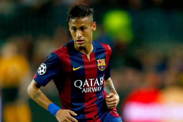 Neymar: Playing with Messi and Suarez an honour. Picture: Getty