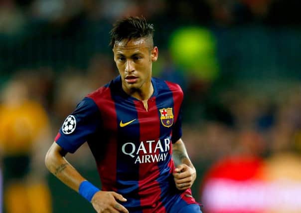 Neymar: Playing with Messi and Suarez an honour. Picture: Getty