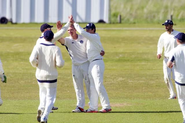 Scotland bowler Richie Berrington, centre, celebrates after dismissing Afghanistans Izatullah Dawlatzai. Picture: Donald MacLeod