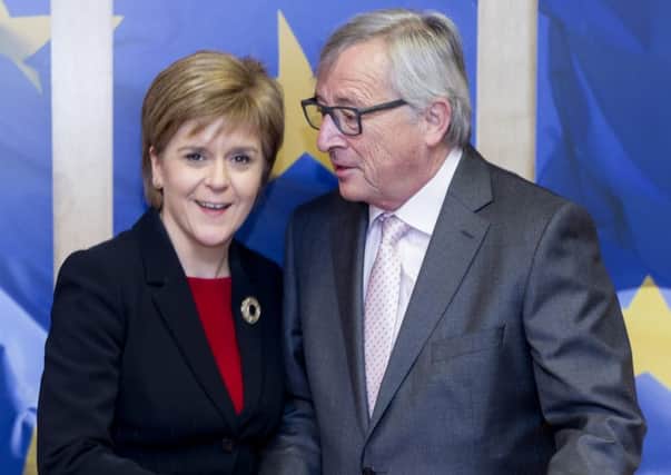 First Minister Nicola Sturgeon with EC Comission President Jean-Claude Juncker. Picture: AP