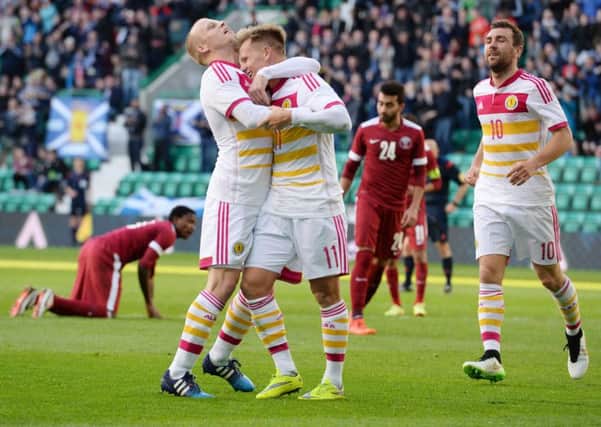 Scotland star Matt Ritchie celebrates his opening goal. Picture: SNS