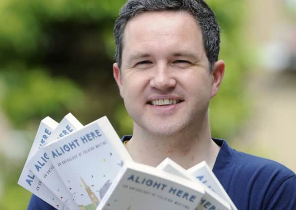 Alan Bissett with copies of Falkirk anthology, Alight Here. Picture: Michael Gillen