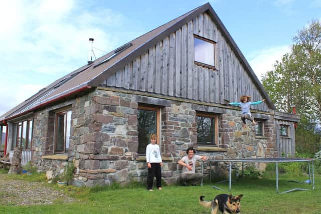 Forest designer Alex Glasgow, his partner Kyla Orr and his children nine-year-old Ash and seven-year-old Poppy in and around their eco-friendly home in Plockton. Picture: Contributed