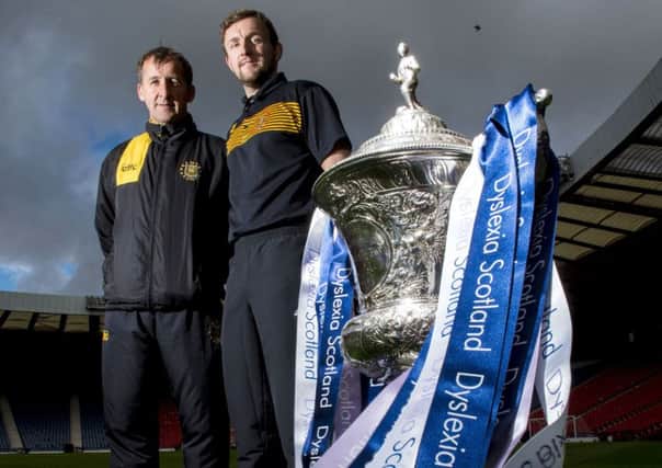 Auchinleck Talbot manager Tommy Sloan, left, and captain James Latta dream of glory, and an 11th cup win, in the Junior Cup final against Musselburgh Athletic today. Photograph: Sammy Turner/SNS