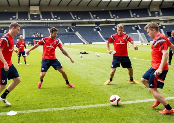 Charlie Mulgrew in training for Scotland. Picture: SNS