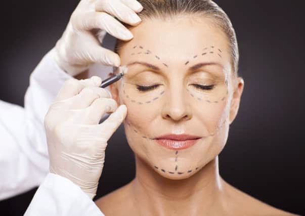 Medics are being encouraged to be more open about risks involved in cosmetic surgery. Picture: Getty