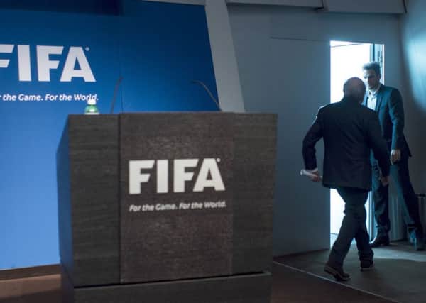 Fifa president Sepp Blatter leaves after announcing his resignation. Picture: AP