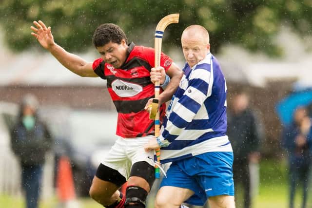 Eddie Tembo, left, battles with Newtonmores Cameron Binnie in the semi-final. Picture: Neil G Paterson