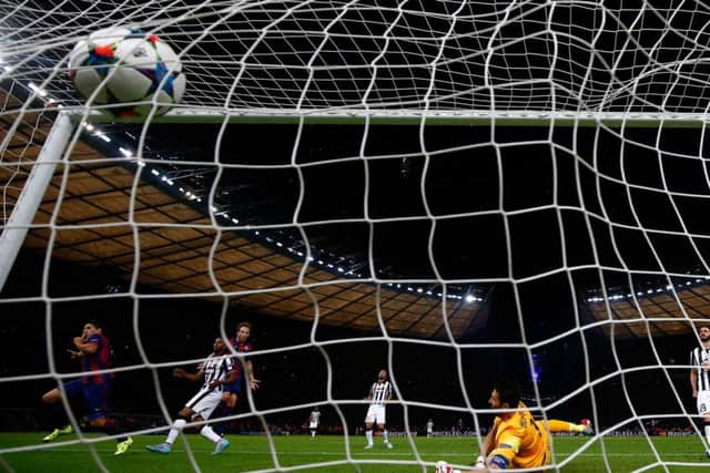 Luis Suarez scores Barcas second and, ultimately, decisive goal. Photograph: Getty