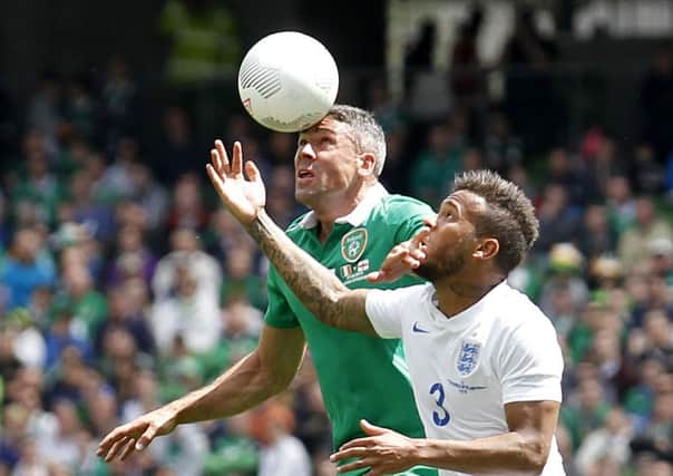 Jon Walters and Ryan Bertrand battle for the ball. Picture: AP