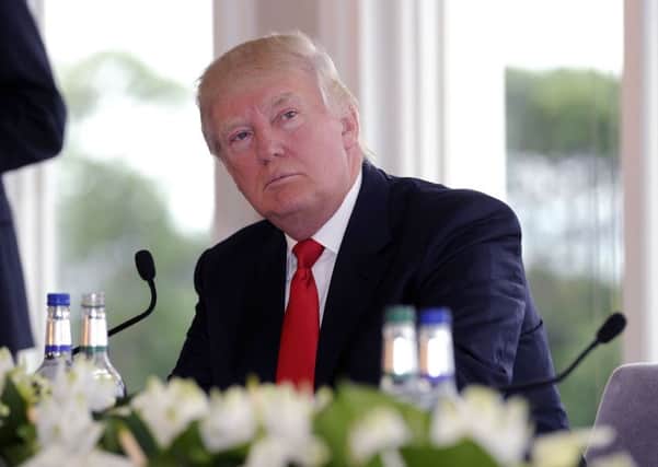 Donald Trump reiterated his warning that he could pull out of his resort near Balmedie if the latest contentious wind farm scheme goes ahead. Picture: John Devlin