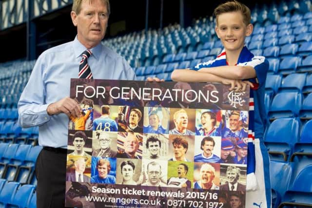 Chairman David King is joined by a young Rangers supporter at the launch of the club's seasonticket renewal campaign. Picture: SNS