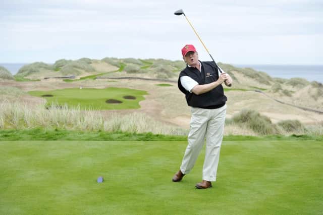 Donald Trump on the 13th hole of his spectacular course near Aberdeen, which could be in line to host the Scottish Open. Picture: Dan Phillips