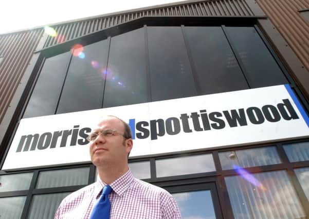 Chief executive of Morris and Spottiswood, George Morris stands outside their Glasgow HQ in Govan. Picture: Robert Perry