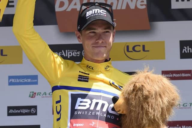 Rohan Dennis celebrates taking the leader's yellow jersey at the Criterium du Dauphine. Picture: AFP/Getty