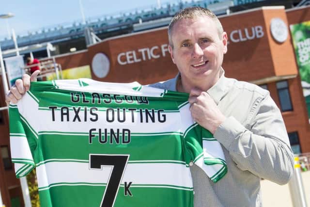 10/06/15
CELTIC PARK - GLASGOW 
Celtic Legend Tom Boyd present a significant donation on behalf of Celtic to sponsor the Glasgow Taxis Outing Trip which takes place on Wednesday 17 June 2015.