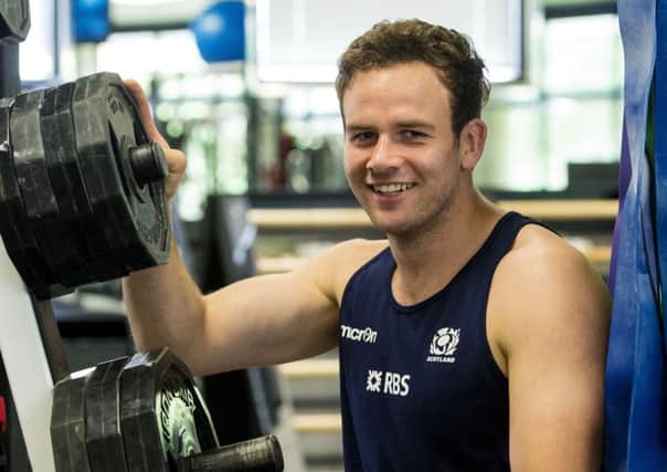 Ruaridh Jackson takes a breather during a morning gym session. Picture: SNS