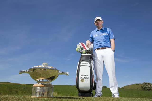 Scotland's Ryder Cup star Stephen Gallacher poses with his bag and the Scottish Open trophy at Gullane. Picture: Kenny Smith