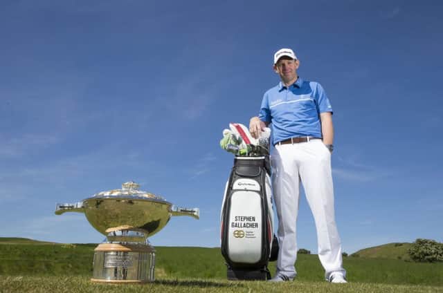 Scotland's Ryder Cup star Stephen Gallacher poses with his bag and the Scottish Open trophy at Gullane. Picture: Kenny Smith