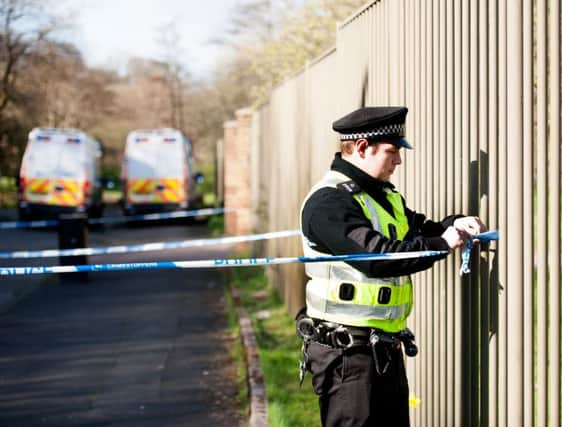 Another crime is investigated but the Reform Scotland think tank says front-line police performance is falling. Picture: John Devlin