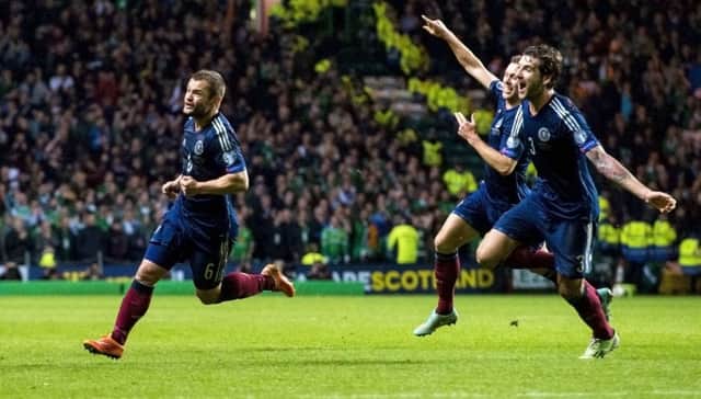 Shaun Maloney, left, wheels away after scoring against Ireland at Celtic Park last November. Picture: SNS