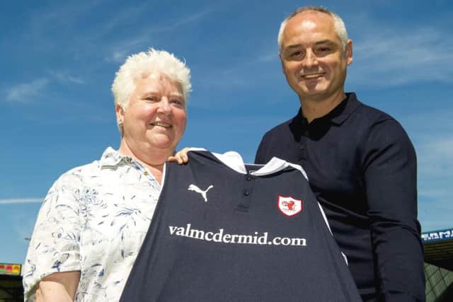 Kit sponsor Val McDermid joins recently-appointed manager Ray McKinnon to unveil Raith Rovers new strip. Picture: SNS