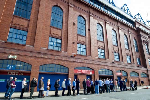 Shareholders arrive for the Rangers general meeting. Picture: SNS