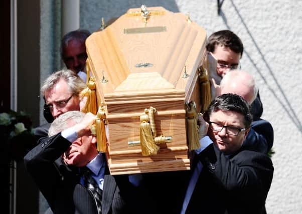 Pallbearers carry the coffin of former Liberal Democrat leader Charles Kennedy. Picture: Getty
