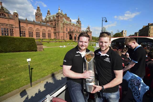 Glasgow Warriors pair Jon Welsh (left) and Finn Russell show off the Pro12 trophy. Picture: SNS