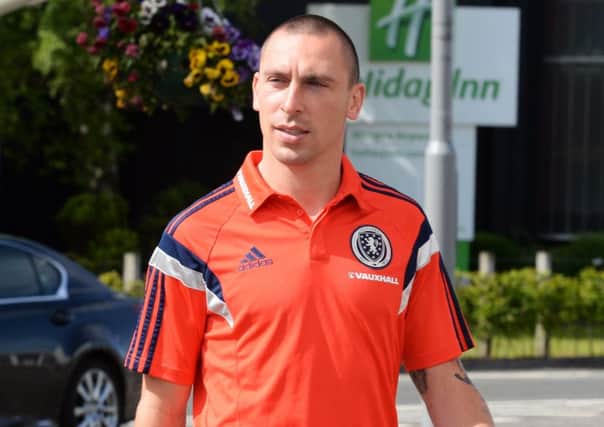 Scott Brown looks relaxed at Glasgow Airport yesterday before making the short trip to Dublin. Picture: SNS