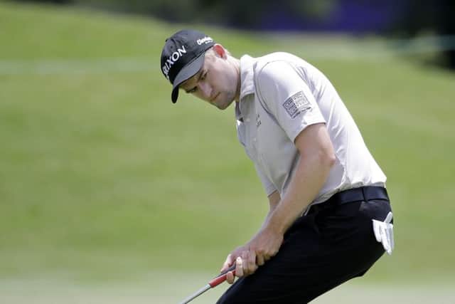 Russell Knox carded six birdies at TPC Southwind to earn a share of the clubhouse lead. Picture: AP