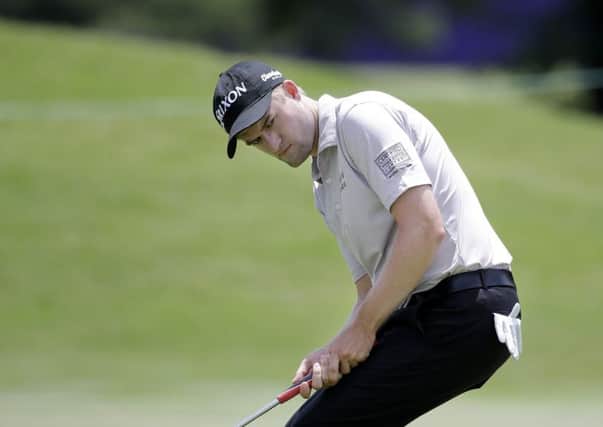 Russell Knox carded six birdies at TPC Southwind to earn a share of the clubhouse lead. Picture: AP