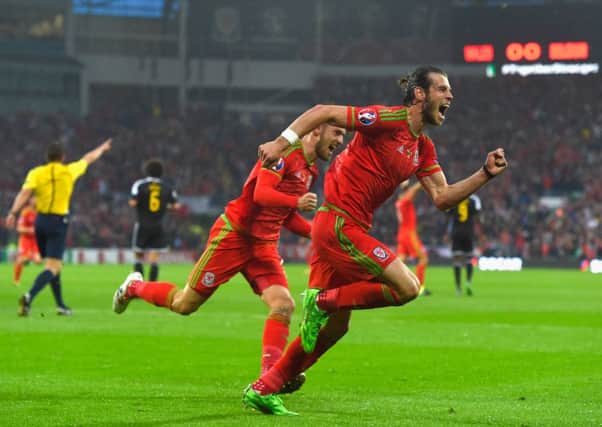Gareth Bale celebrates his 25th-minute goal that was enough to secure victory for Wales over Belgium in Cardiff. Picture: Getty