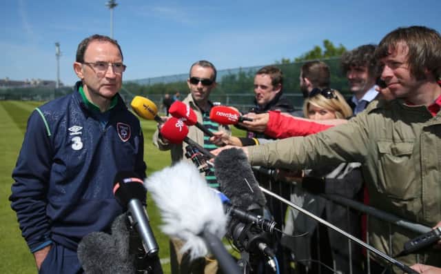 Martin O'Neill fields questions after a training session in Dublin. Picture: PA