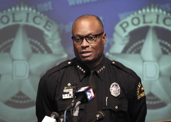 Brown told a news conference that the shootout began about 12:30 a.m. Saturday, when the suspects parked in front of the building and began firing. Picture: AP