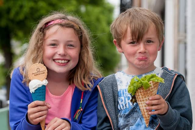 Maya Knight, nine, enjoys a seaweed flavour ice cream cone, but her brother Christopher, seven, admitted he still preferred chocolate. Picture: Wullie Marr