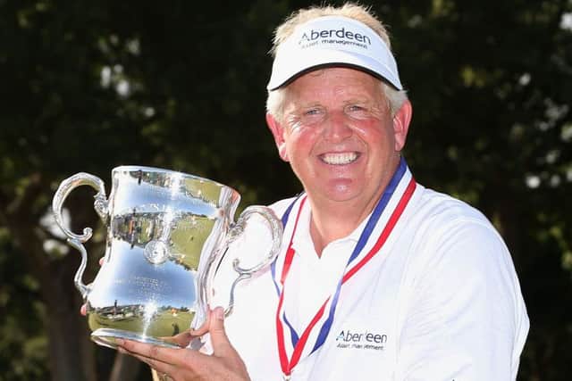 Colin Montgomerie with the trophy after winning the 2014 US Senior Open. Picture: Getty