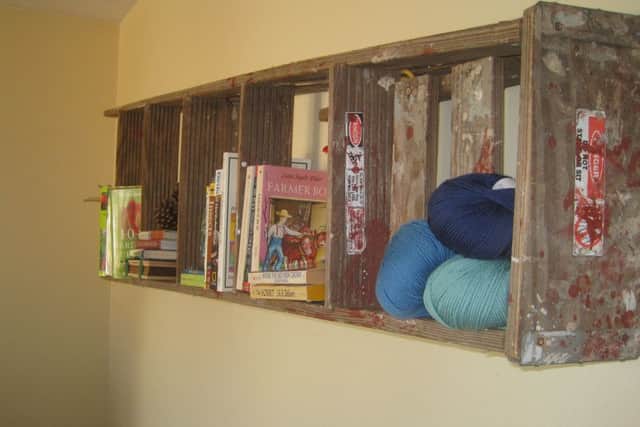 An older ladder converted into a bookcase. Picture: submitted