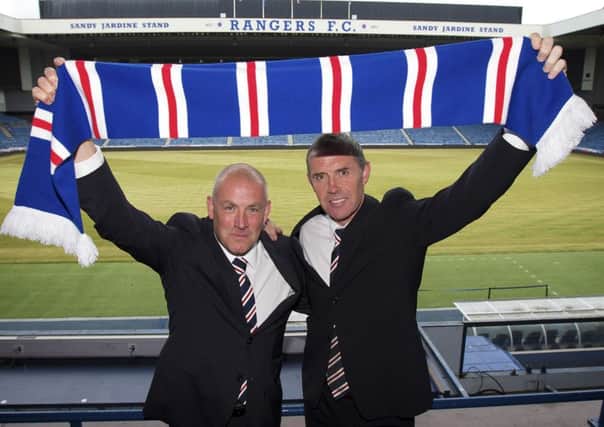 Mark Warburton, left, has been given a three-year deal as Rangers manager with Davie Weir alongside him as assistant. Picture: Rangers FC/PA