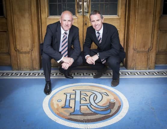 Mark Warburton, left, and former club captain David Weir were introduced at Ibrox yesterday. Picture: PA