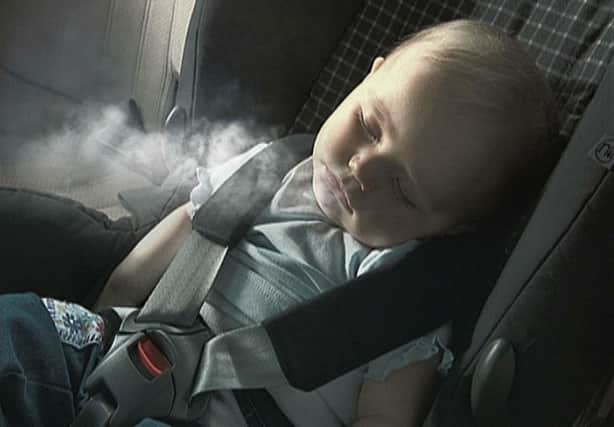 Legislation banning smoking in cars carrying children has obvious health benefits but may be difficult to enforce. Picture: PA