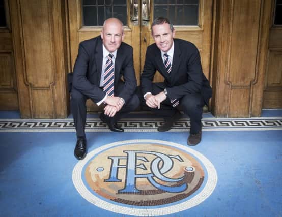 New Rangers manger Mark Warburton and assistant manager David Weir . Picture: PA