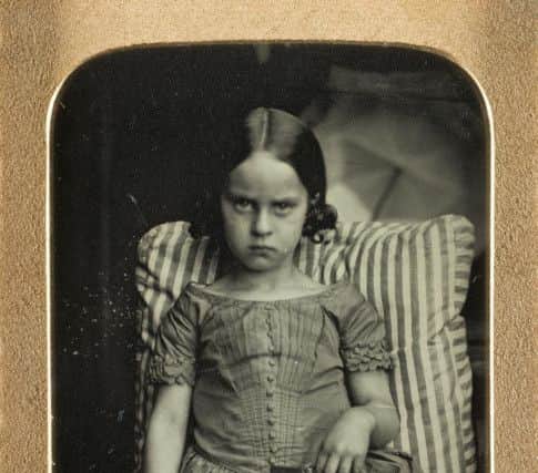 Unknown little girl holding a portrait of a man, possibly her dead father, Ross & Thomson of Edinburgh,1847-60.
© Howarth Loomes Collection at National Museums Scotland.