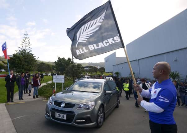 The hearse leaves Te Rauparaha Arena following the funeral service in Porirua. Picture: Getty