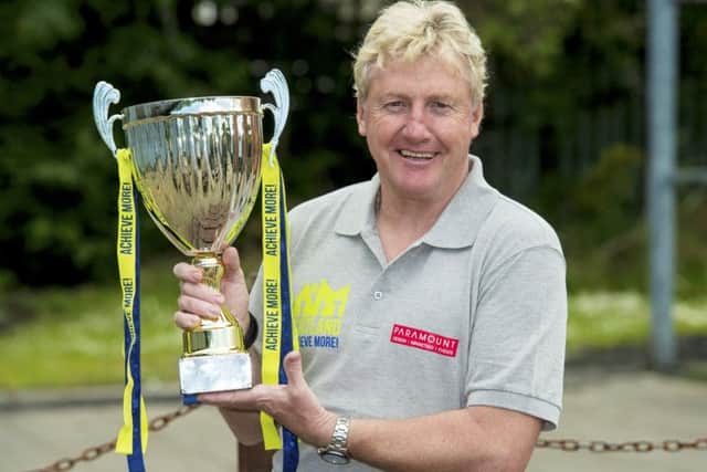 Frank McAvennie helps promote the Auld Enemy Charity Match. Picture: SNS